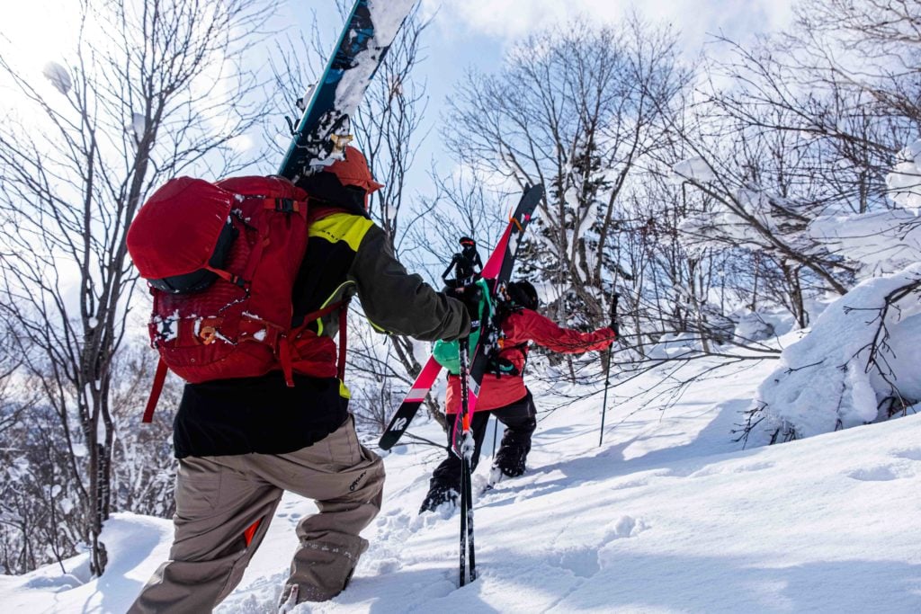 osprey backpack with skis attached when boot packing