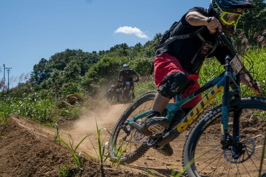 japanese cycling legend mamiken riding his kona operator mountain bike in Niseko 